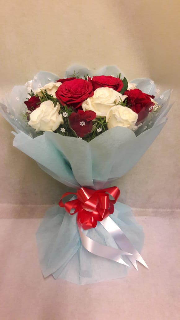 Red & White Roses in Blue Paper  cake delivery Delhi