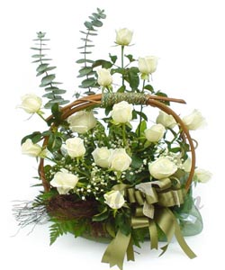 25 White Roses arranged in a basket cake delivery Delhi