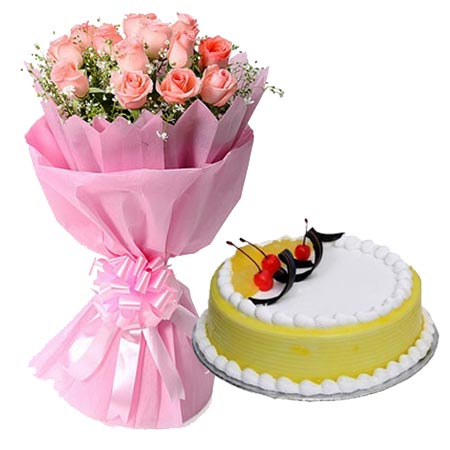 12 Pink Roses in Paper with 1/2kg Pineapple Cakecake delivery V.V.nagar