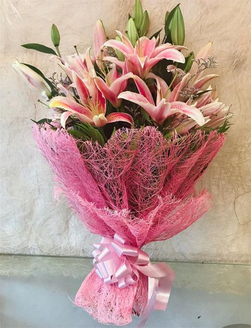 Pink Oriental Lilly in Jute Packing cake delivery Delhi